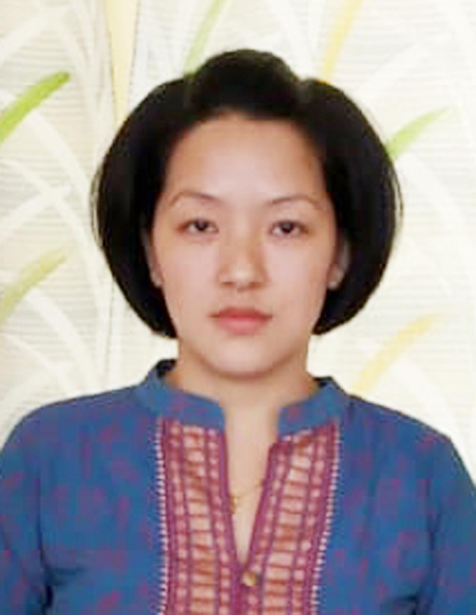 Dr. Minam Yomso